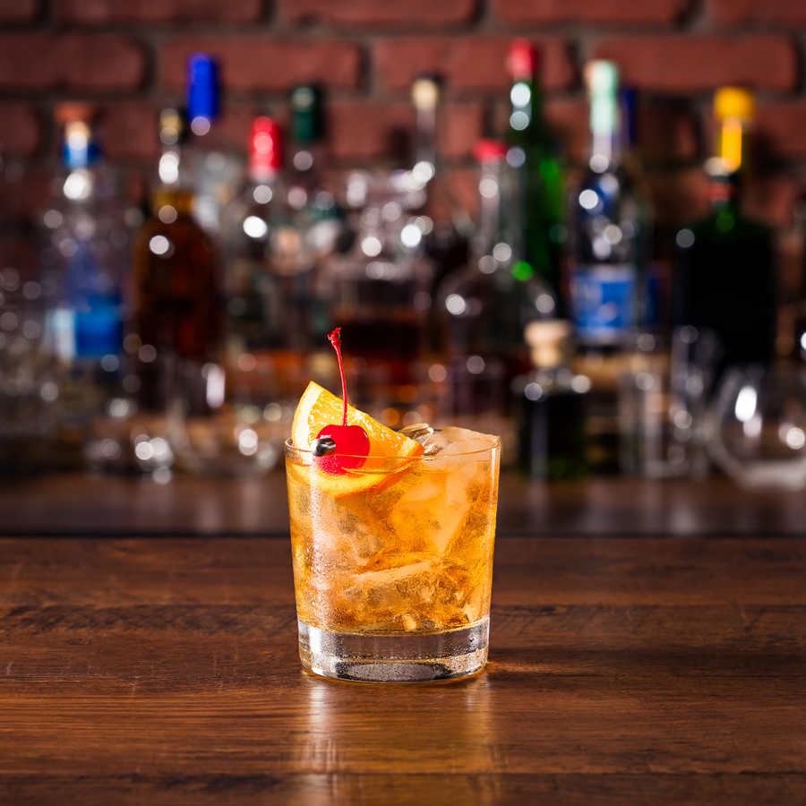 Old Fashioned bourbon cocktail with orange peel