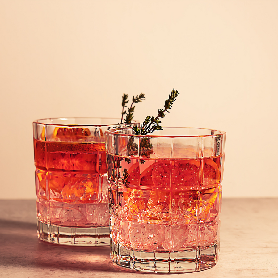 Smoked bourbon cocktail with rosemary garnish